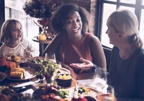 family talking at dinner