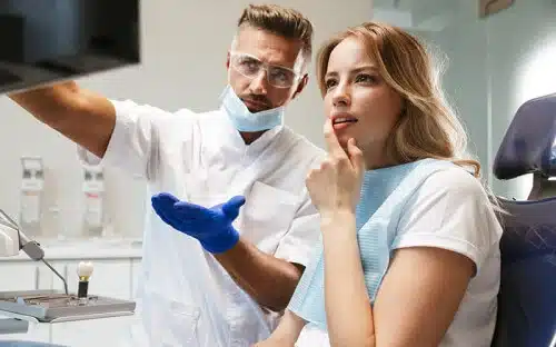 girl with dentist learning