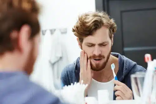 man with tooth pain