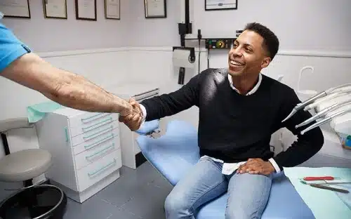 shaking hands with dentist