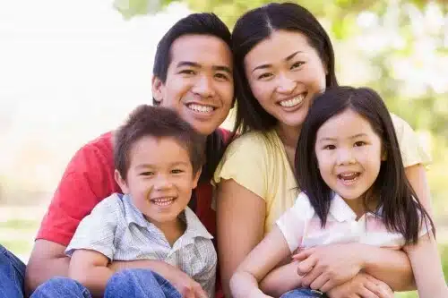 smiling family mom dad daughter son web