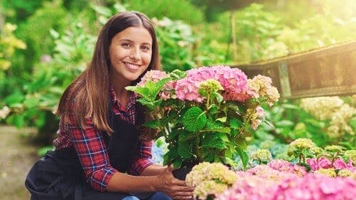 woman holding flowers